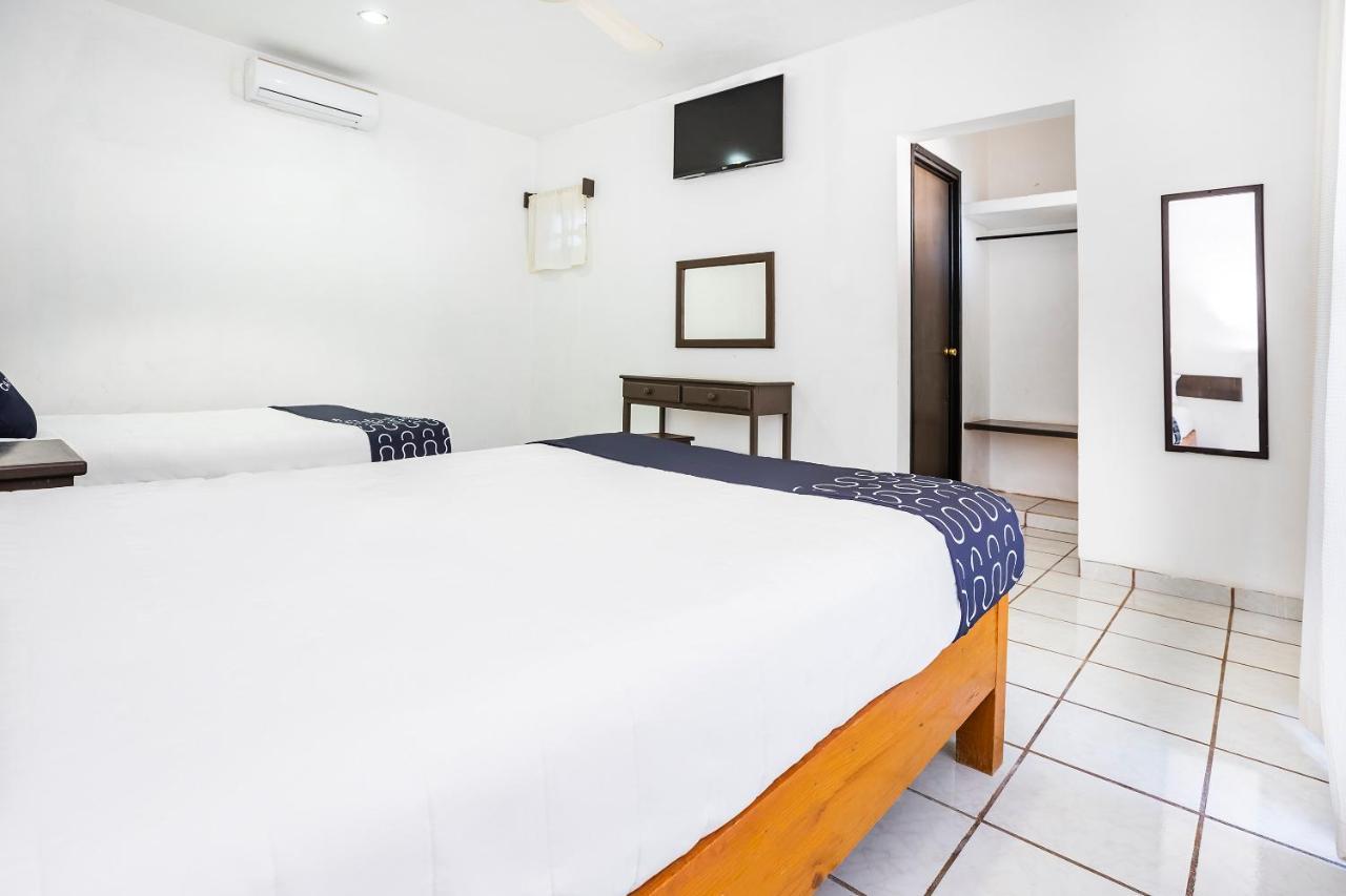 Capital O Oxtankah,Chetumal Bay Hotel Calderitas Exterior photo